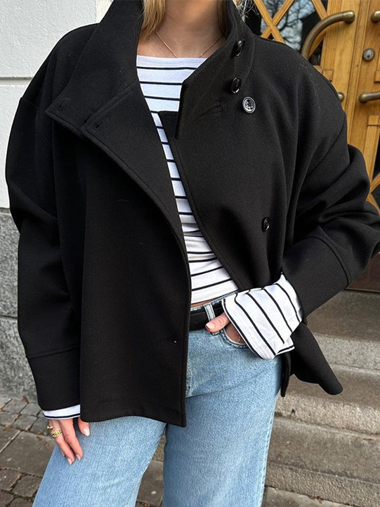 Women's casual short coat with relaxed fit, button closure. High neckline adds warmth to fall outerwear.