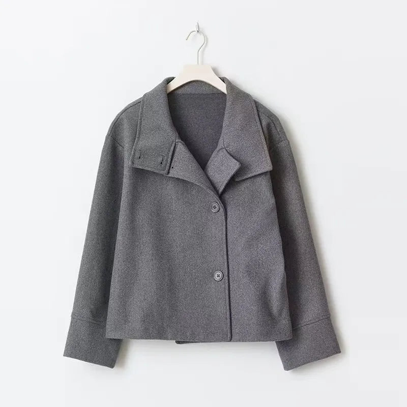 Comfortable relaxed fit women's short coat, button closure & high neckline. Perfect casual winter wear.
