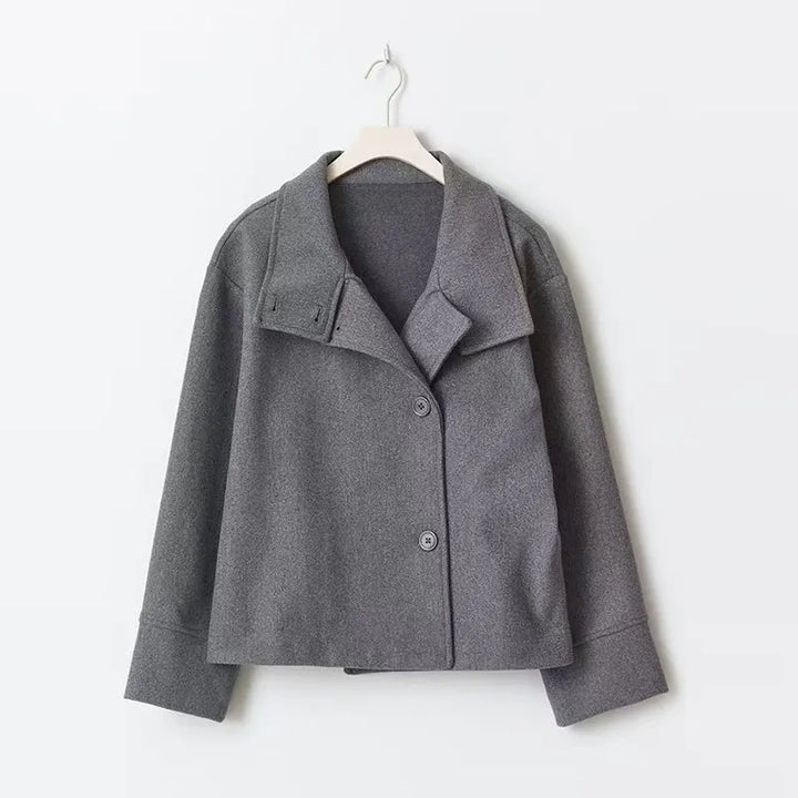 Comfortable relaxed fit women's short coat, button closure & high neckline. Perfect casual winter wear.