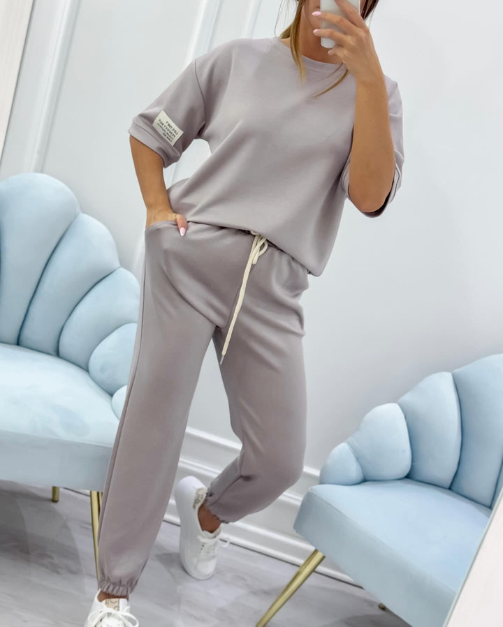Summer women's short sleeve set, relaxed fit. Comfortable matching set for versatile casual outfits.