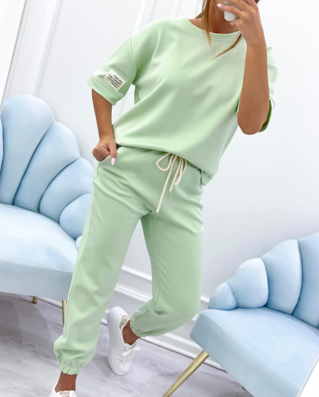 Casual women's short sleeve set, relaxed fit. Matching two-piece ideal for everyday comfort & style.