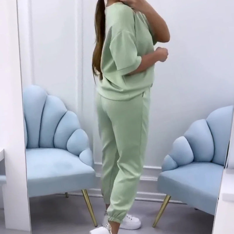 Women's relaxed fit short sleeve loungewear set. Comfortable two-piece for versatile summer wear.