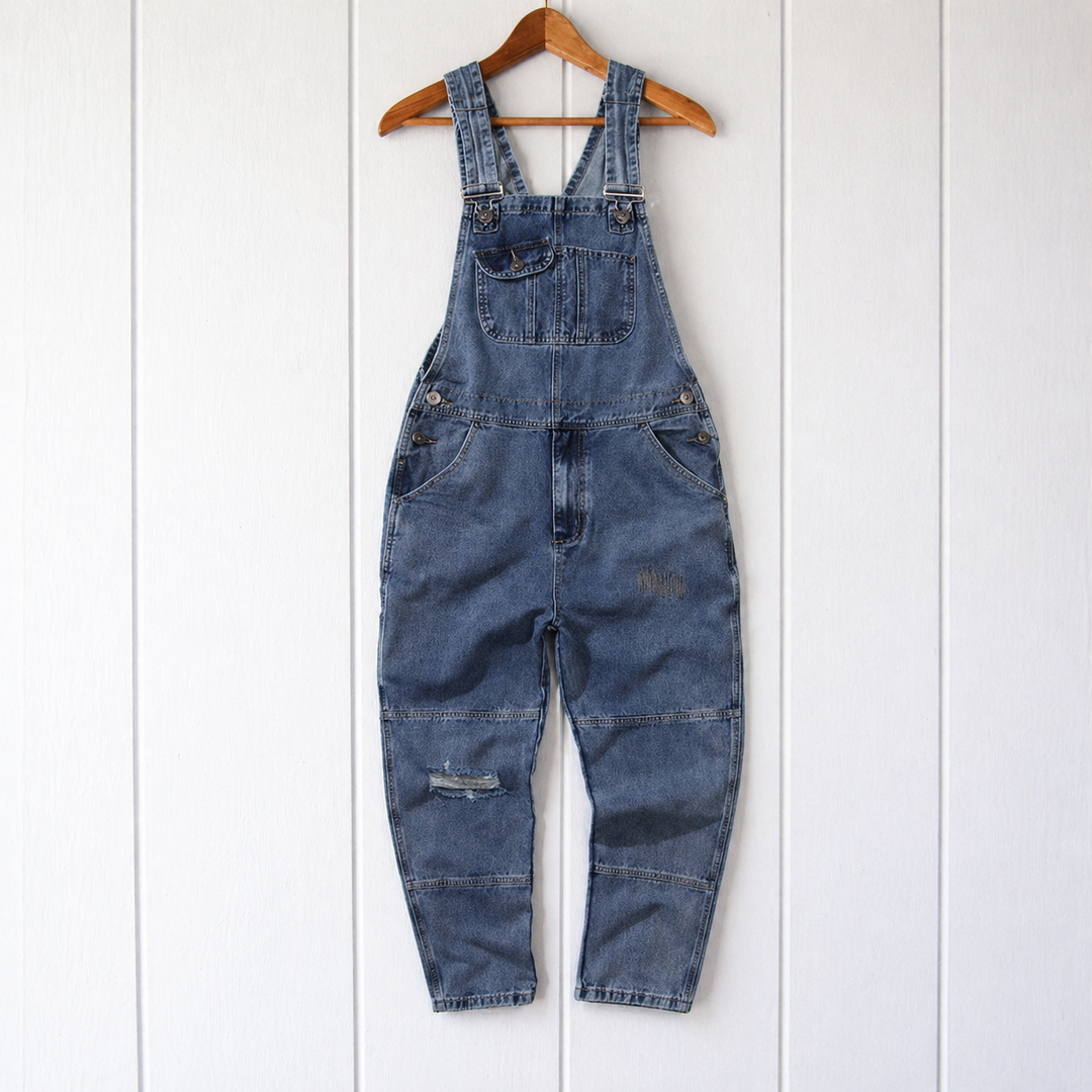 Stylish women's relaxed fit overalls featuring practical utility pockets and adjustable straps for daily wear.