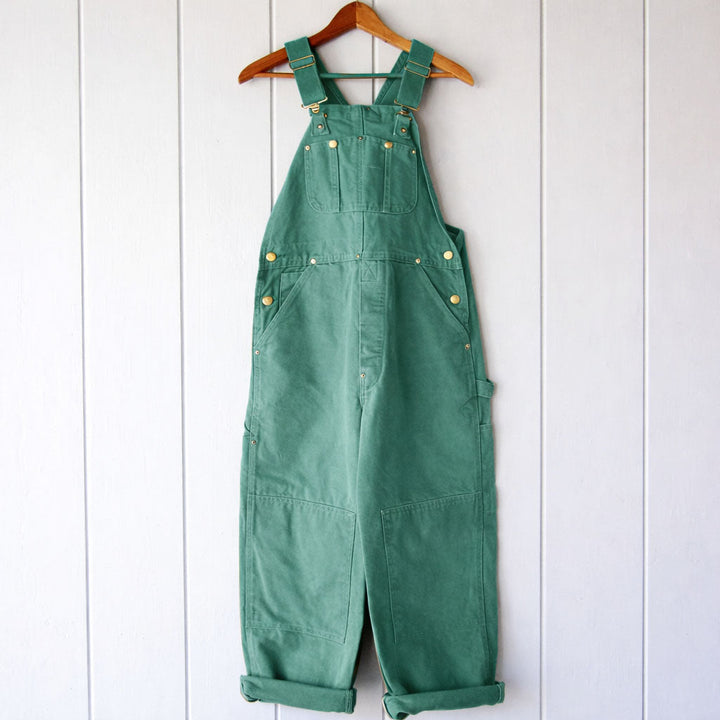 Chic women's relaxed fit jumpsuit overalls, a comfortable sleeveless design for effortless everyday fashion.