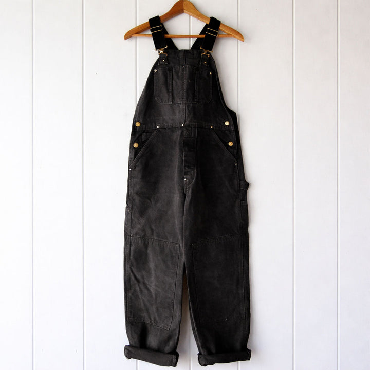 Comfortable women's relaxed fit overalls with adjustable straps and multiple utility pockets, ideal for casual use.