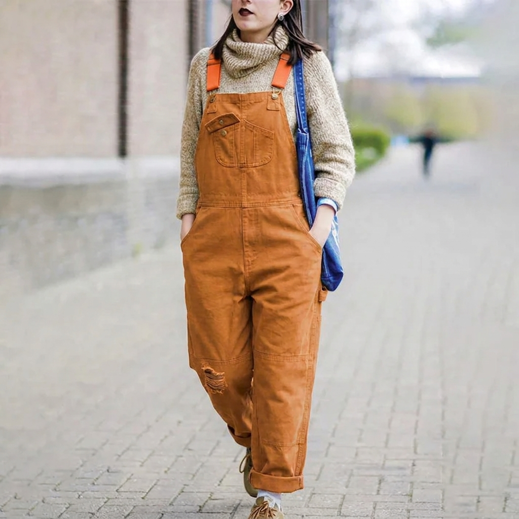 Fashionable women's relaxed fit overalls; sleeveless, chic, and comfortable for any casual occasion.
