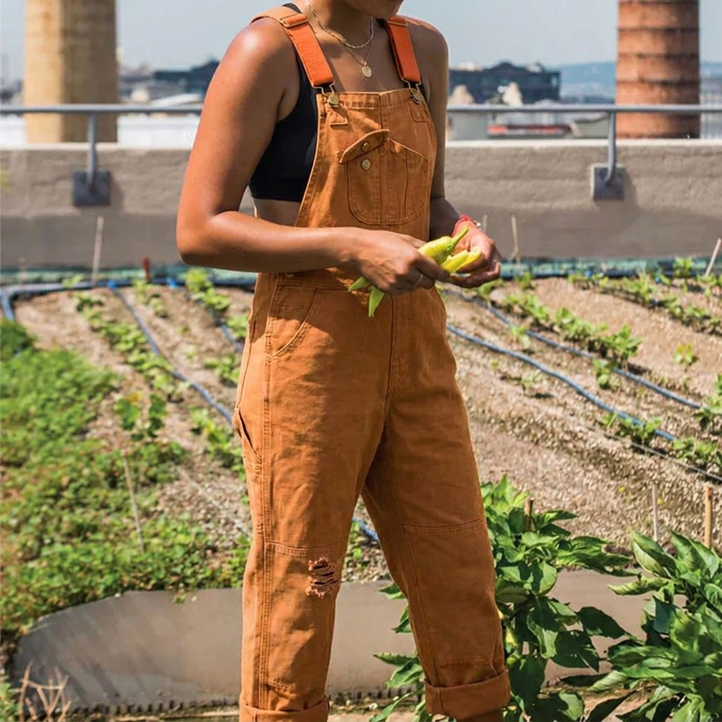 Versatile women's relaxed fit overalls, a sleeveless jumpsuit with adjustable straps for ultimate comfort.