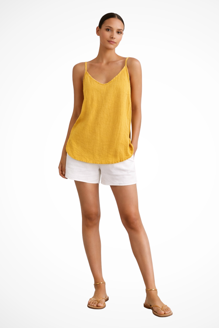 Casual women's spaghetti strap tank top, ideal for summer vacation or everyday relaxed fit. Sleeveless & comfortable.