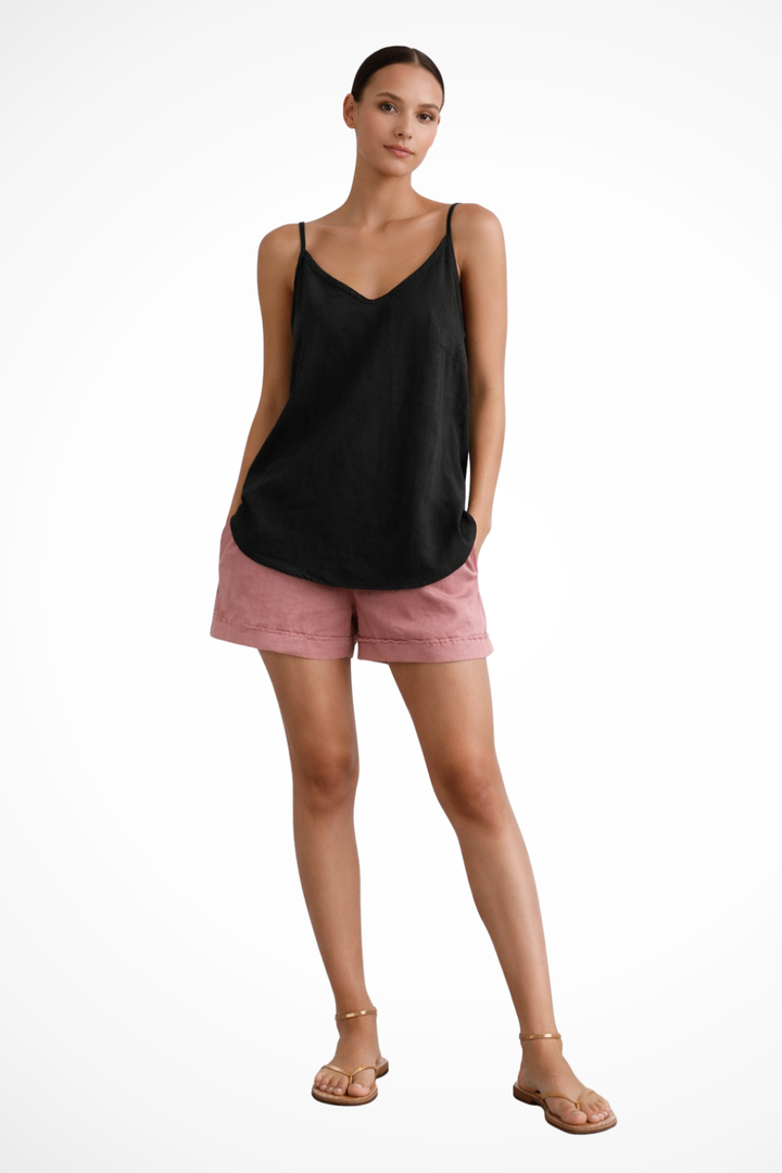 Chic women's relaxed fit tank top with delicate spaghetti straps. Perfect lightweight essential for summer casual outfits.