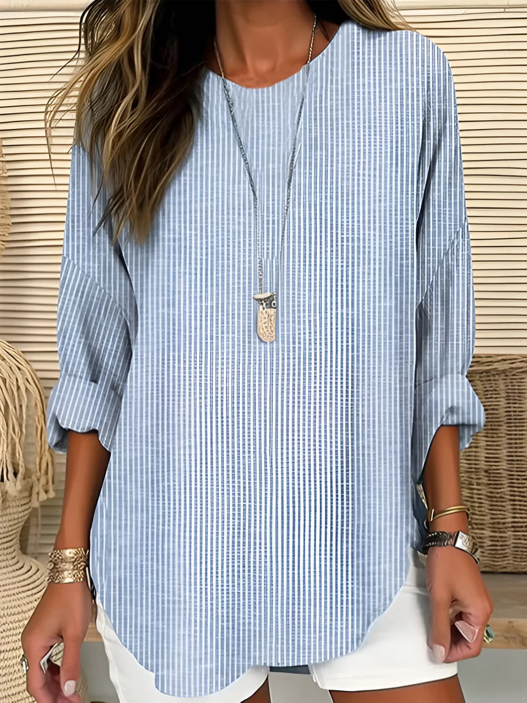 Women's relaxed fit striped long sleeve blouse. Ideal for casual everyday style, comfort & versatile fashion.