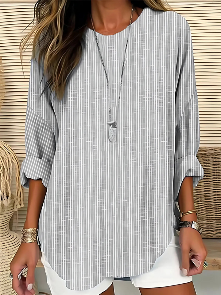 Comfortable women's striped long sleeve top. Relaxed fit blouse, perfect for versatile casual outfits & everyday style.