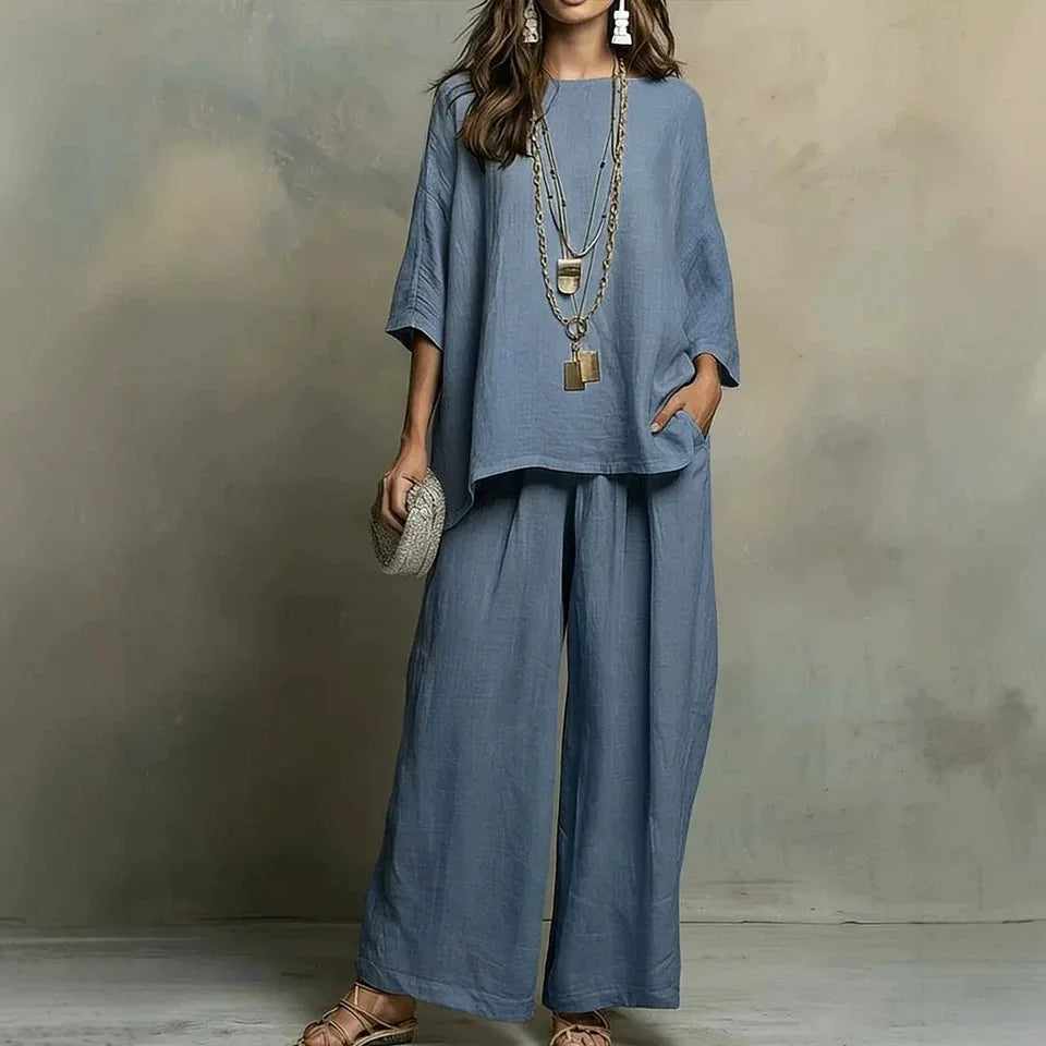 Breathable women's two-piece loungewear set. Matching relaxed fit summer top and wide-leg pants for ultimate comfort.