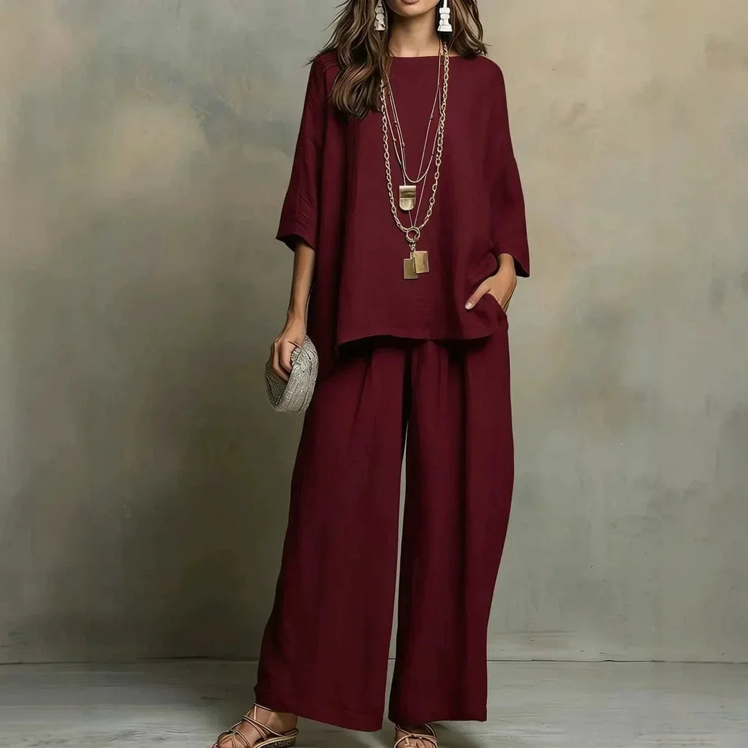 Lightweight, breathable women's summer pant set. Stylish relaxed fit two-piece outfit with wide-leg pants for warm weather.