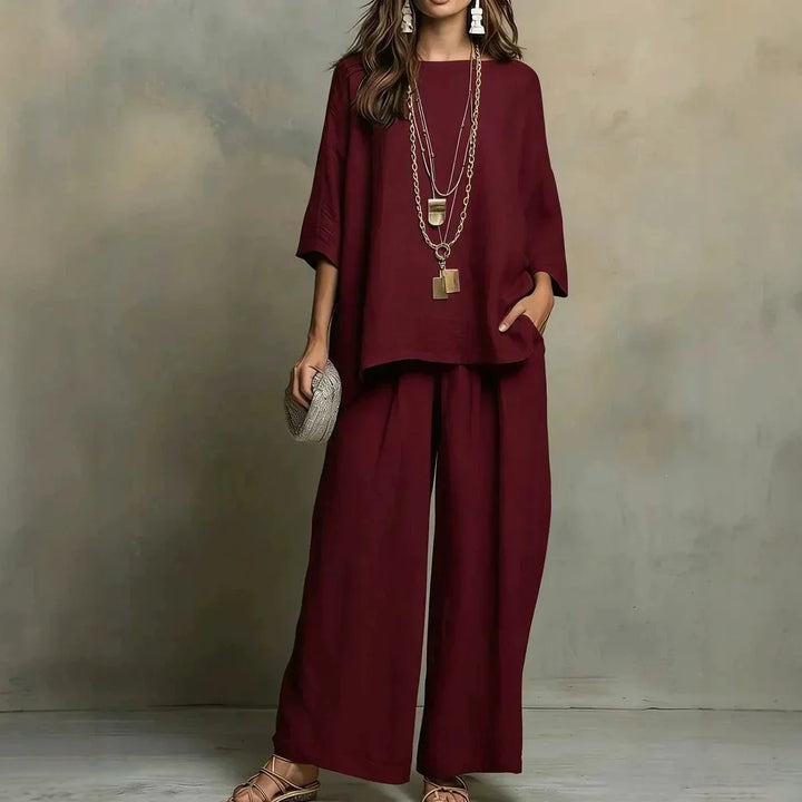 Lightweight, breathable women's summer pant set. Stylish relaxed fit two-piece outfit with wide-leg pants for warm weather.