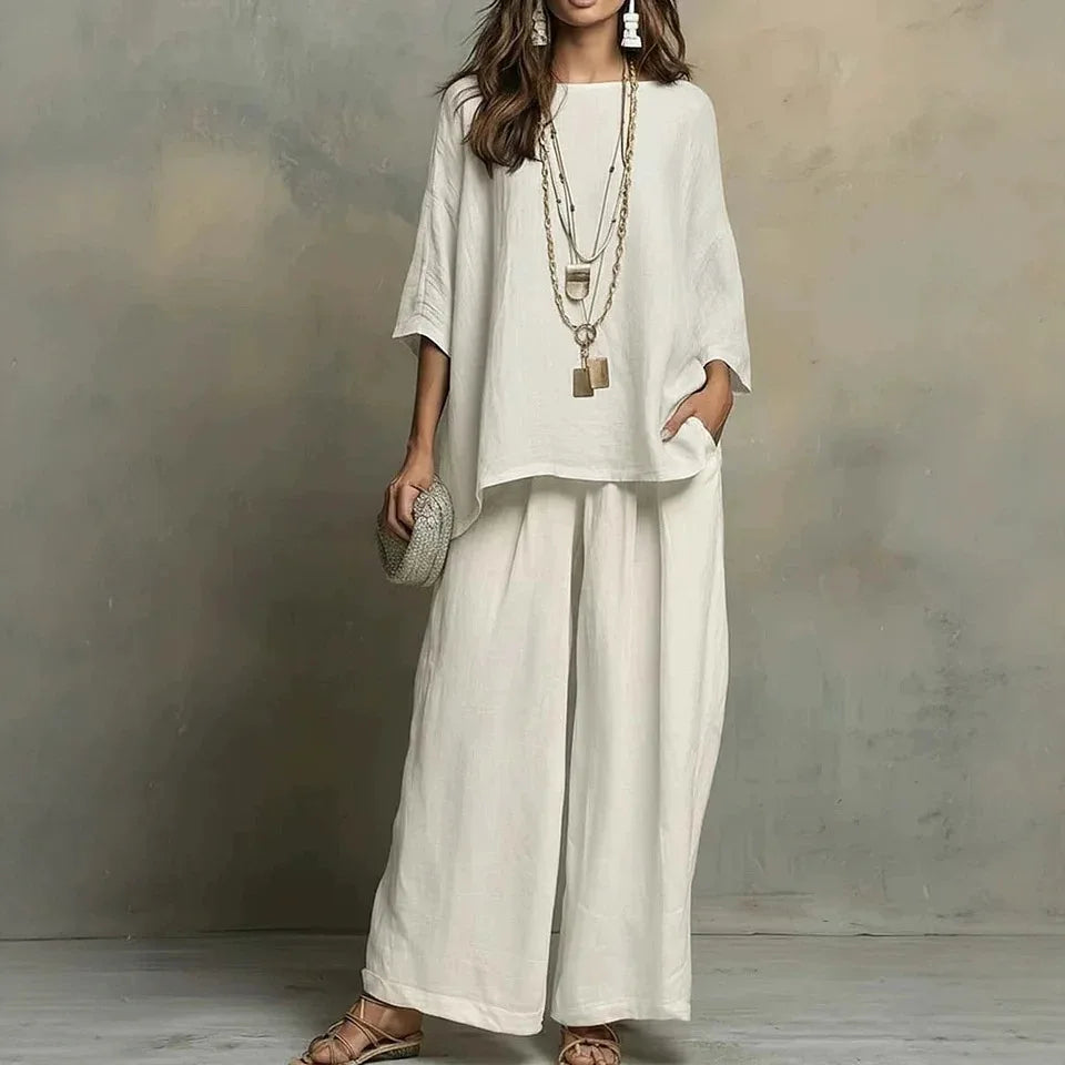 Women's versatile two-piece summer outfit. Relaxed fit top & wide-leg pants provide breathable comfort for any casual occasion.
