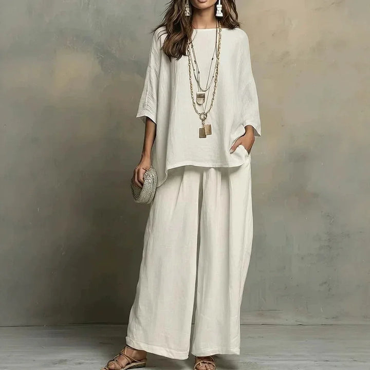 Women's versatile two-piece summer outfit. Relaxed fit top & wide-leg pants provide breathable comfort for any casual occasion.
