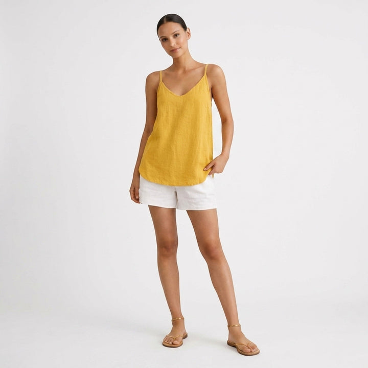 Essential women's sleeveless tank with spaghetti straps & relaxed fit. Easy wear.