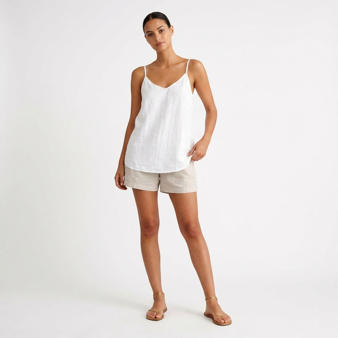 Soft women's sleeveless top with spaghetti straps, offering a relaxed and comfy fit.