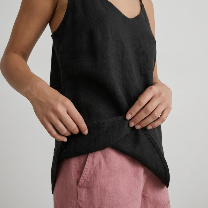 Breathable women's everyday tank top, relaxed fit, thin spaghetti straps for comfort.