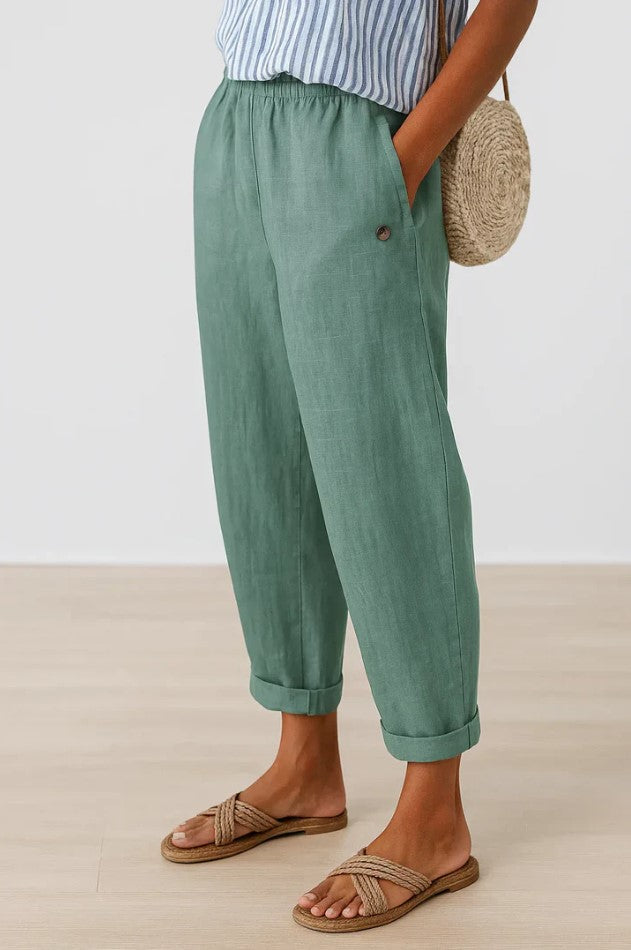 Full length view of women's relaxed fit trousers, designed for comfort with an elastic waistband.