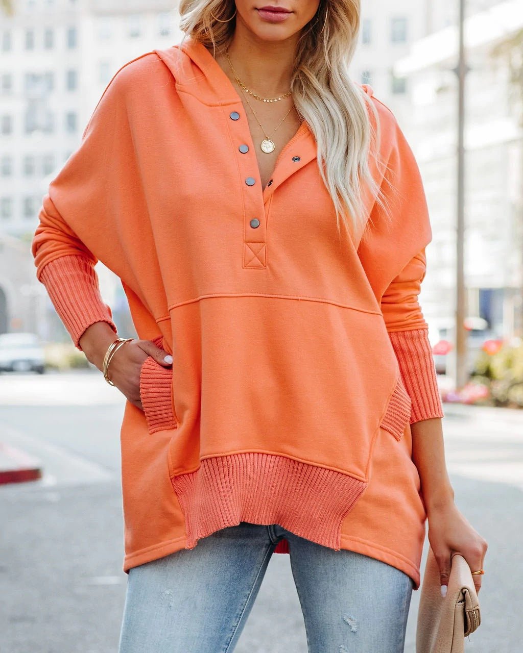 Versatile women's tunic hoodie, a relaxed fit pullover sweatshirt ideal for casual and loungewear.