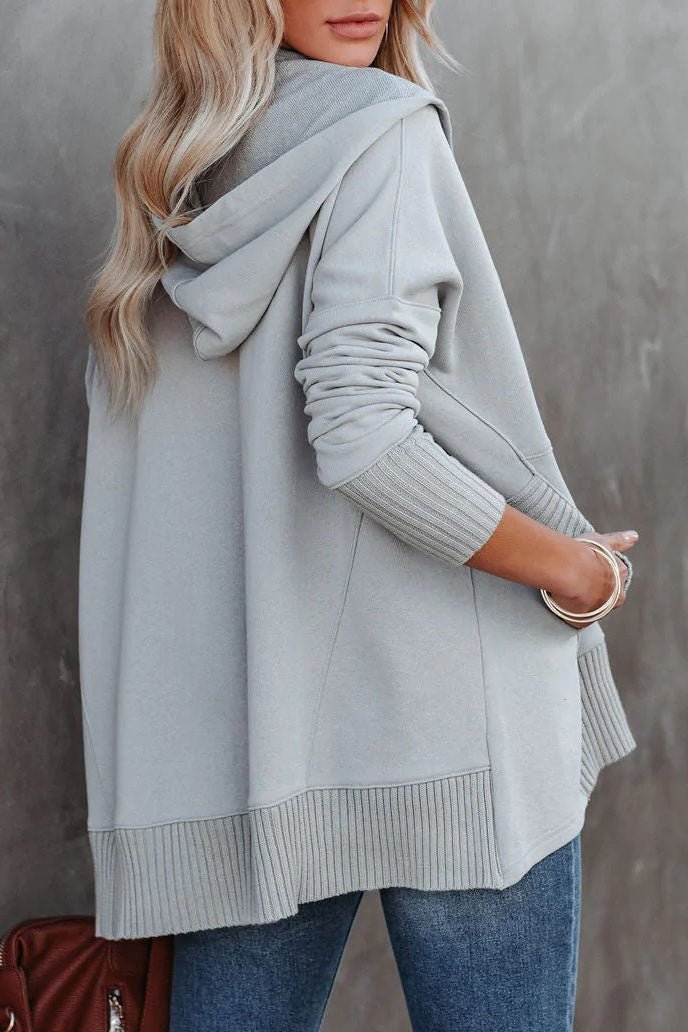 Women's longline tunic hoodie, a relaxed fit pullover sweatshirt for versatile casual styling.