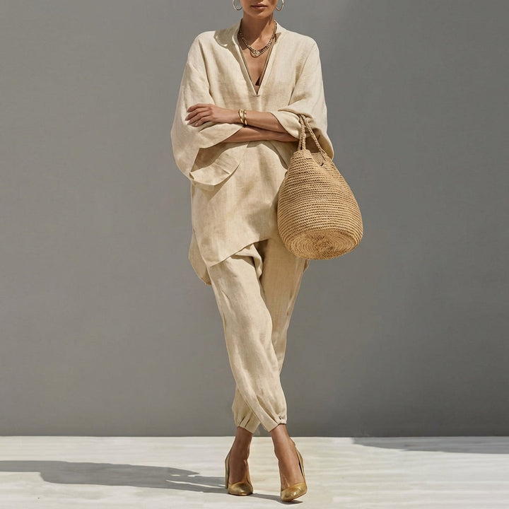 Elegant women's matching set: relaxed tunic top & tapered pants. Perfect for vacation wear.
