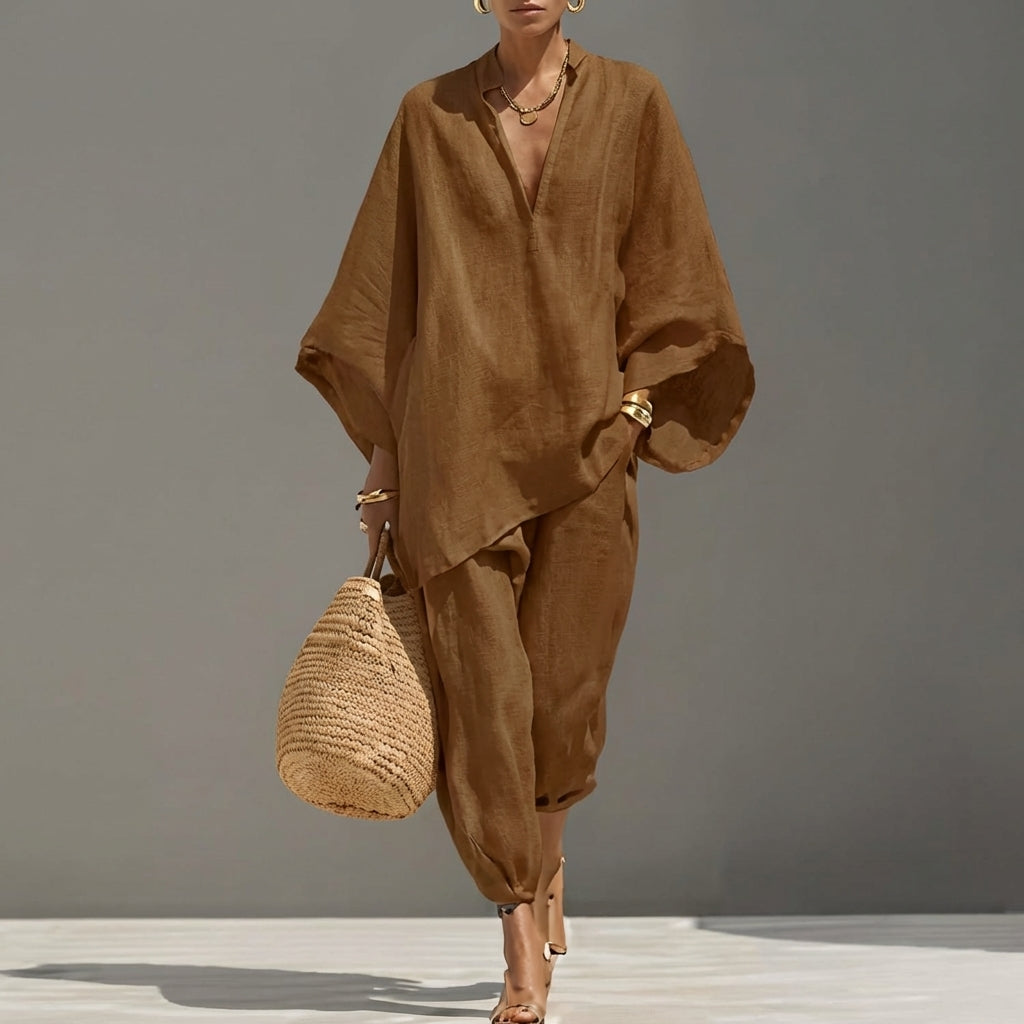 Relaxed fit women's tunic and tapered pants set, ideal for travel, comfort, and elegance.