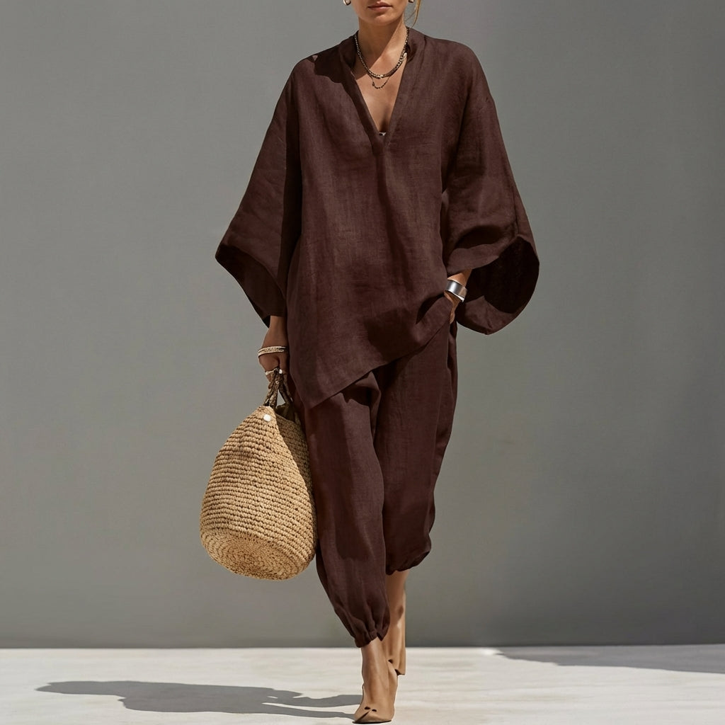 Women's travel outfit: relaxed tunic top & tapered pants set. Stylish, comfortable, and versatile.