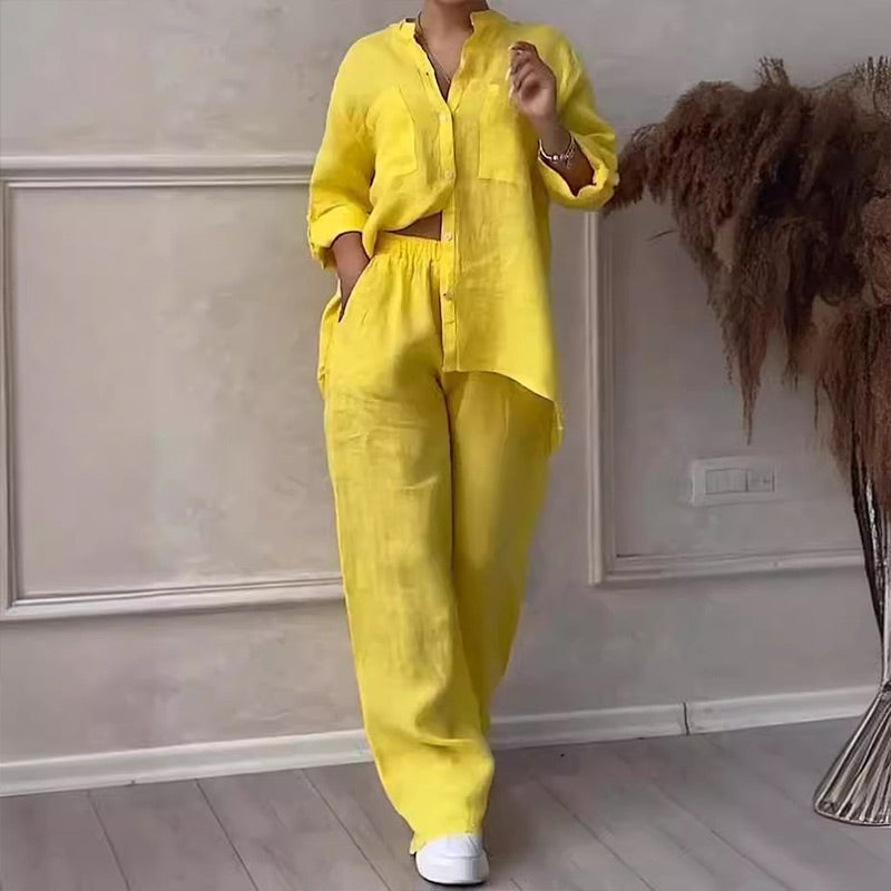Casual women's two piece set featuring a relaxed fit button-down shirt paired with matching wide-leg pants.