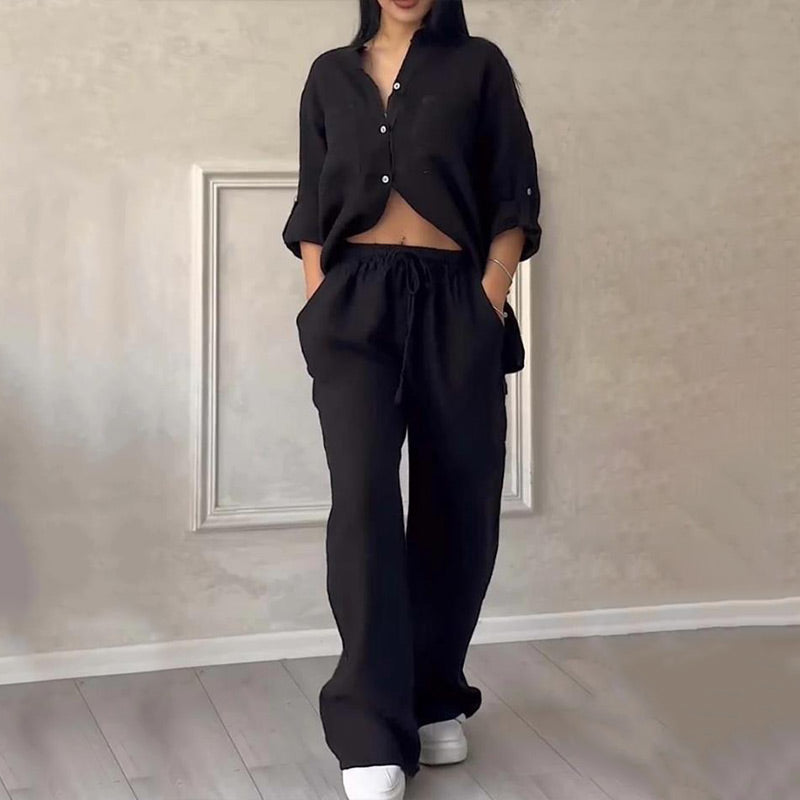 Versatile women's summer two piece outfit: relaxed fit button-down shirt & wide-leg pants. Perfect casual set.