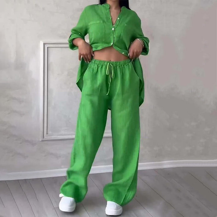 Woman wearing a relaxed fit two piece outfit: button-down shirt and wide leg pants, perfect for casual wear.