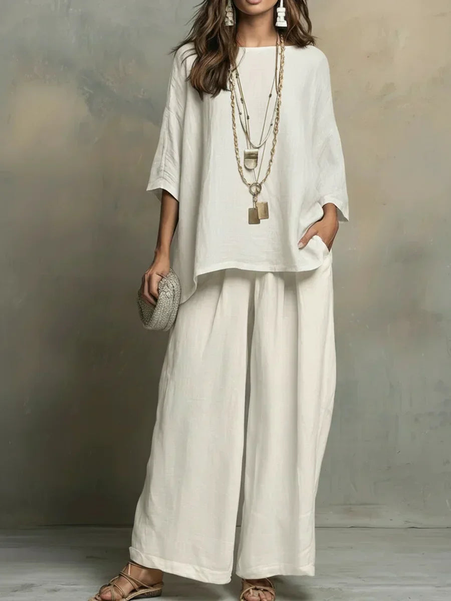 Women's relaxed fit two-piece shirt and wide-leg pants set, perfect for casual summer wear.