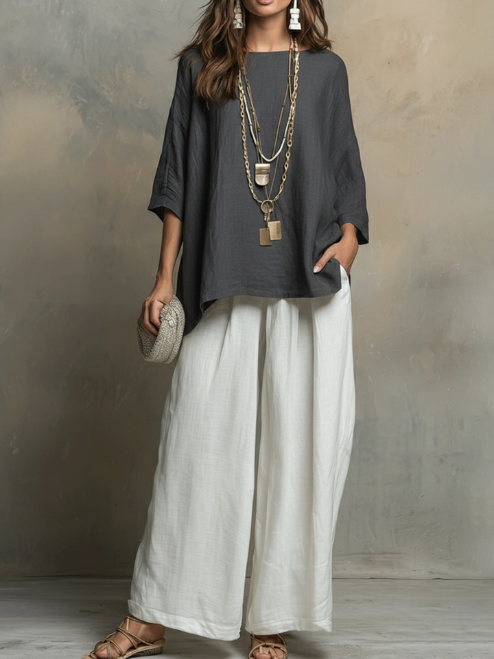 Stylish women's two-piece shirt and wide-leg pants set in a relaxed fit. Great for casual summer outfits.