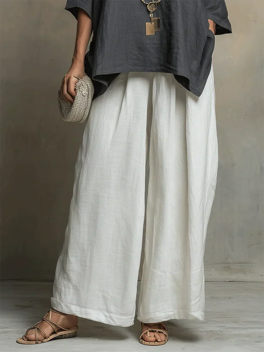 Women's comfortable relaxed fit two-piece shirt and wide-leg pants set, ideal for casual summer outfits.
