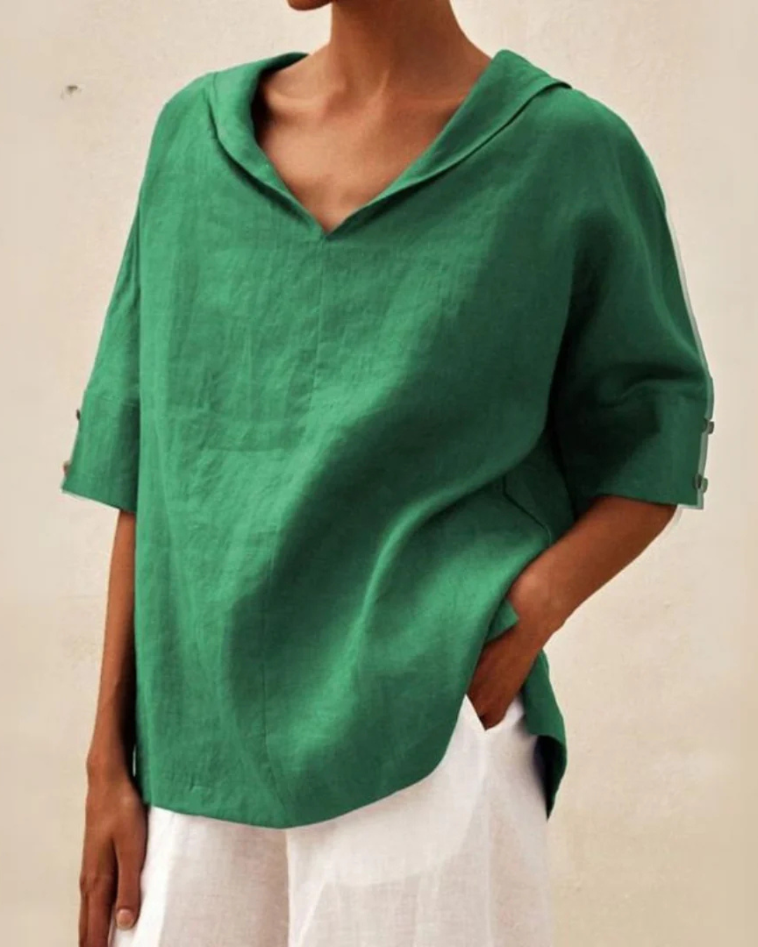 Women's relaxed fit V-neck blouse with short sleeves, perfect for casual wear & everyday comfort.