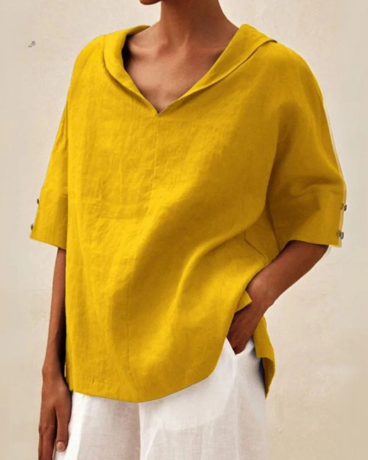 Stylish women's V-neck blouse, relaxed fit short sleeve top for versatile casual & office wear.
