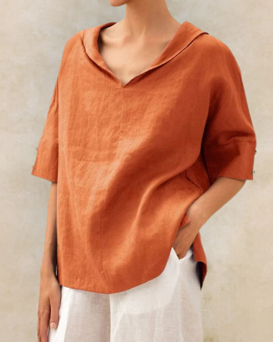 Comfortable women's relaxed V-neck blouse, short sleeve top ideal for summer casual everyday style.