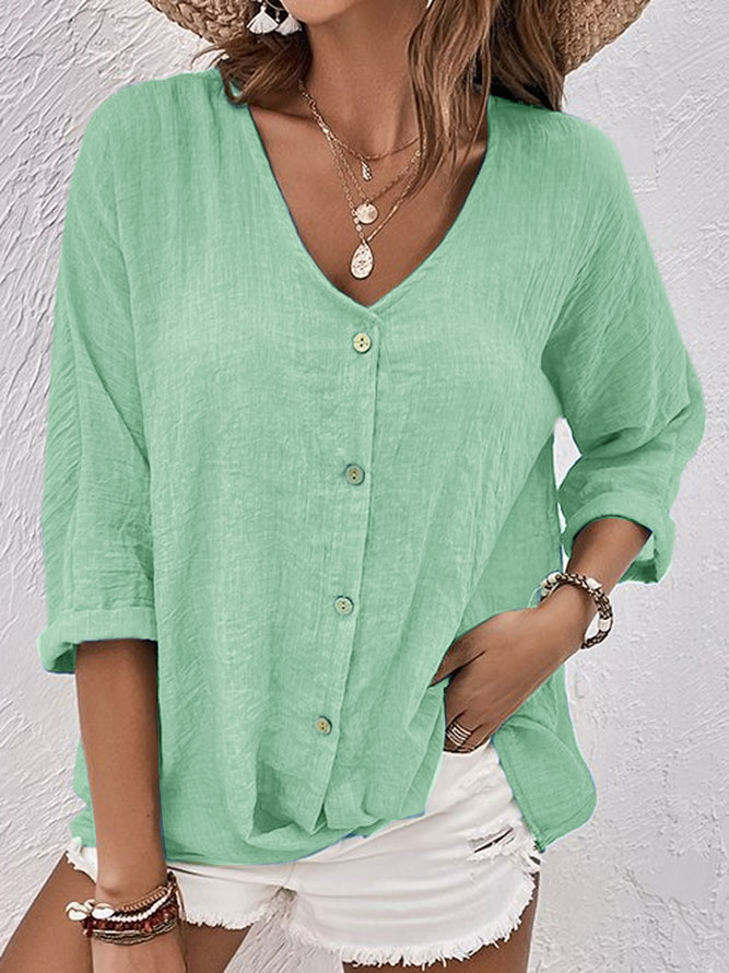 Everyday women's long sleeve V-neck button-down shirt, relaxed and versatile for any casual look.