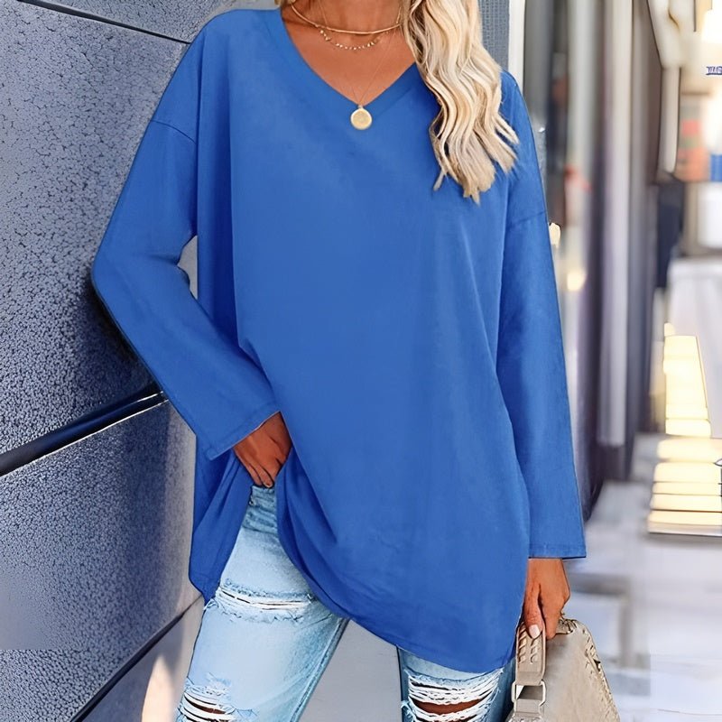Chic women's V-neck blouse, long sleeve, relaxed fit, versatile for casual fashion.