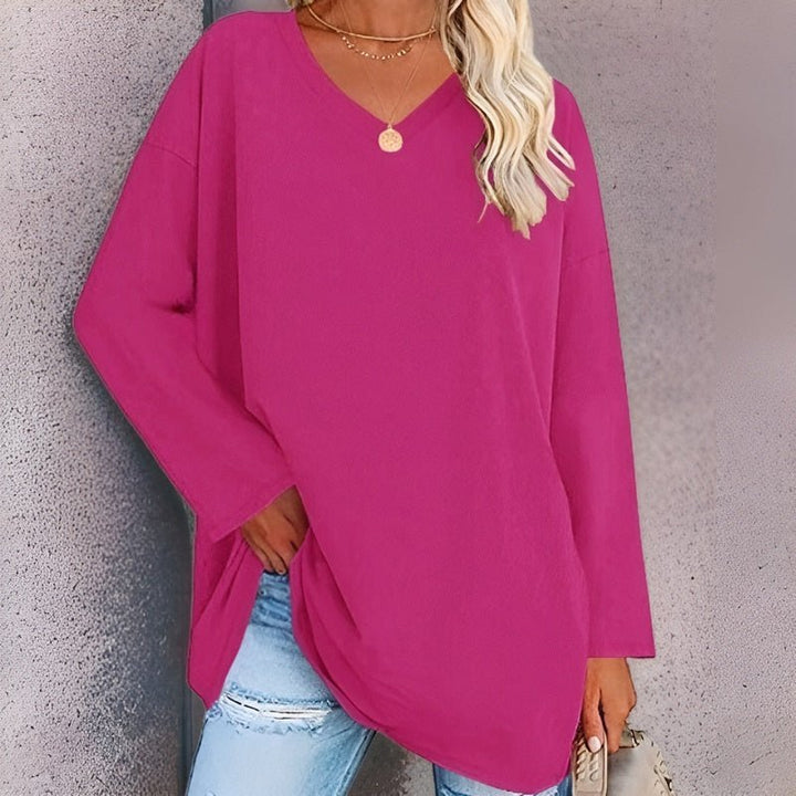 Soft women's long sleeve V-neck top, relaxed fit, ideal for everyday comfort & casual wear.