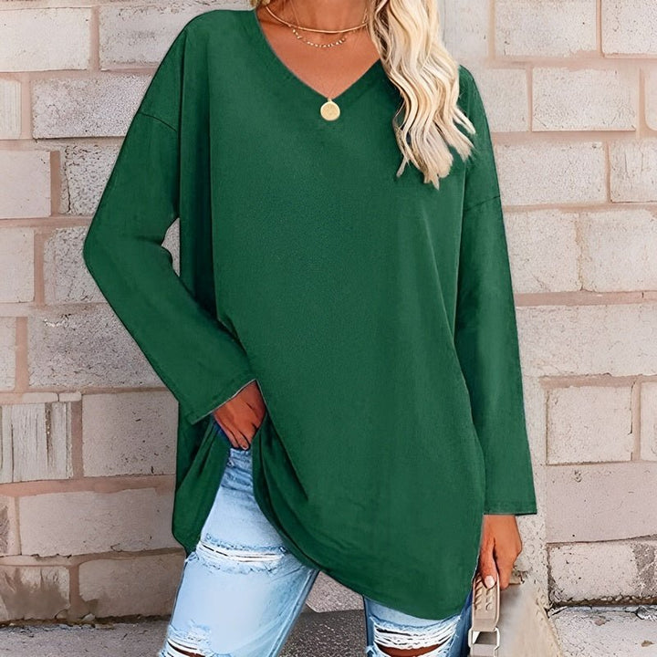 Front view of a women's relaxed V-neck shirt, long sleeve, casual everyday comfort.