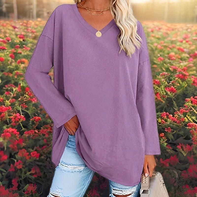 Comfortable women's relaxed fit V-neck blouse, long sleeve, soft fabric for casual wear.