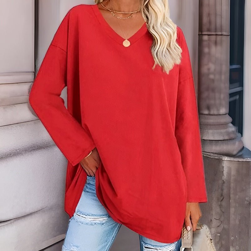 Stylish women's V-neck top, long sleeve, relaxed fit, perfect for versatile casual outfits.