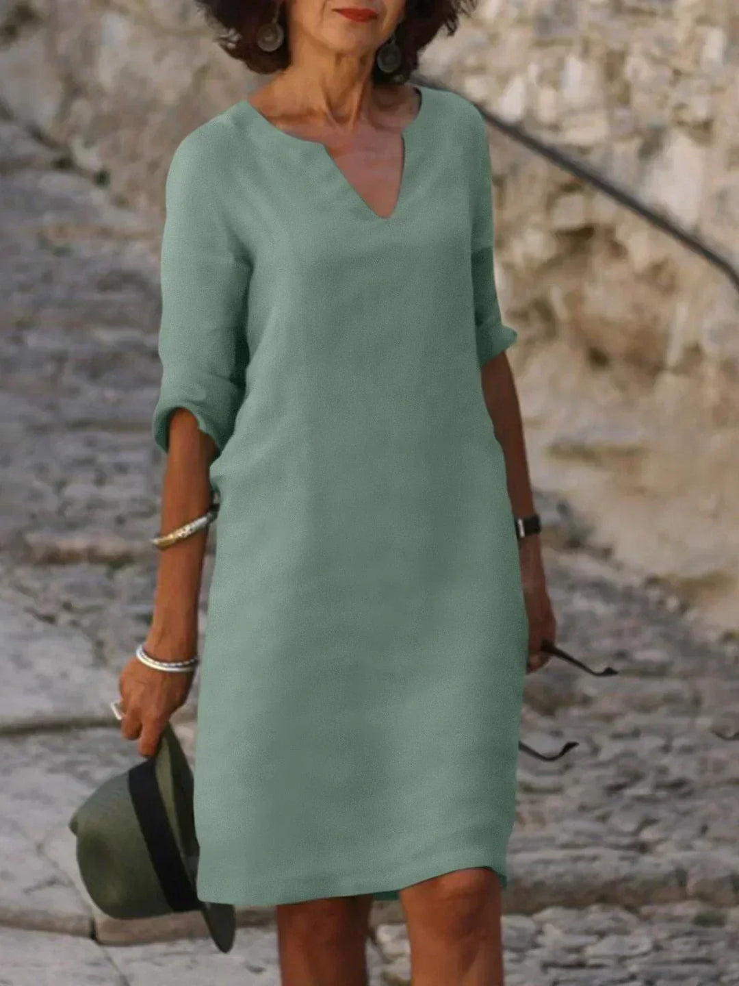 Elegant women's 3/4 sleeve V-neck midi dress. A relaxed fit summer essential, perfect for travel & everyday style.