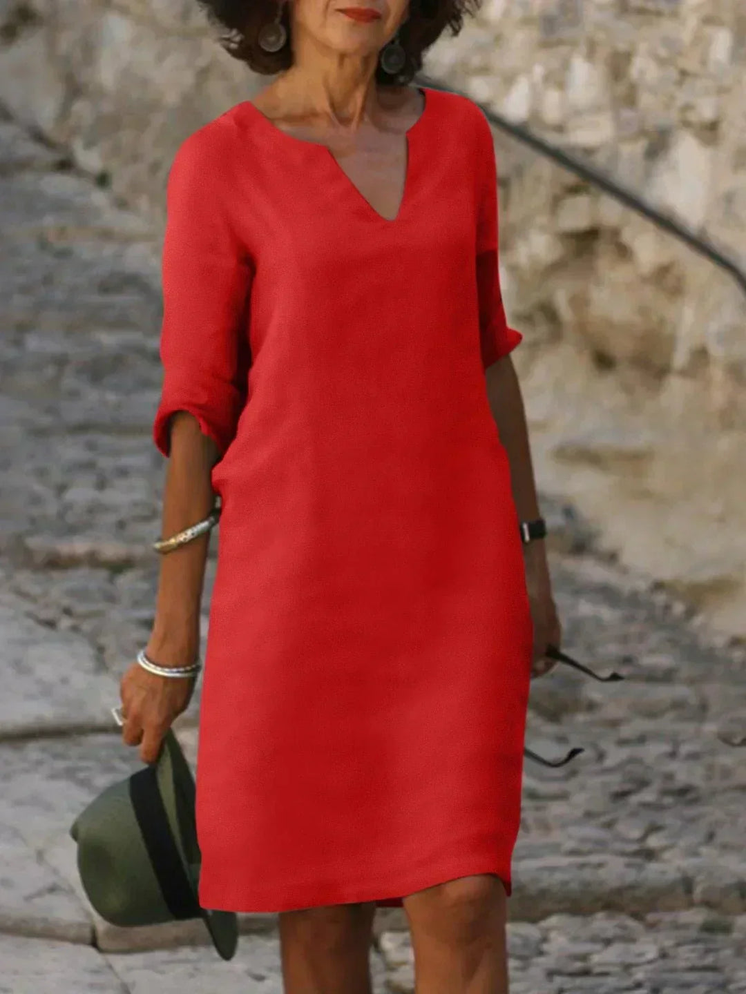 Casual women's V-neck midi dress with 3/4 sleeves. Stylish, comfortable, and perfect for travel or daily wear.