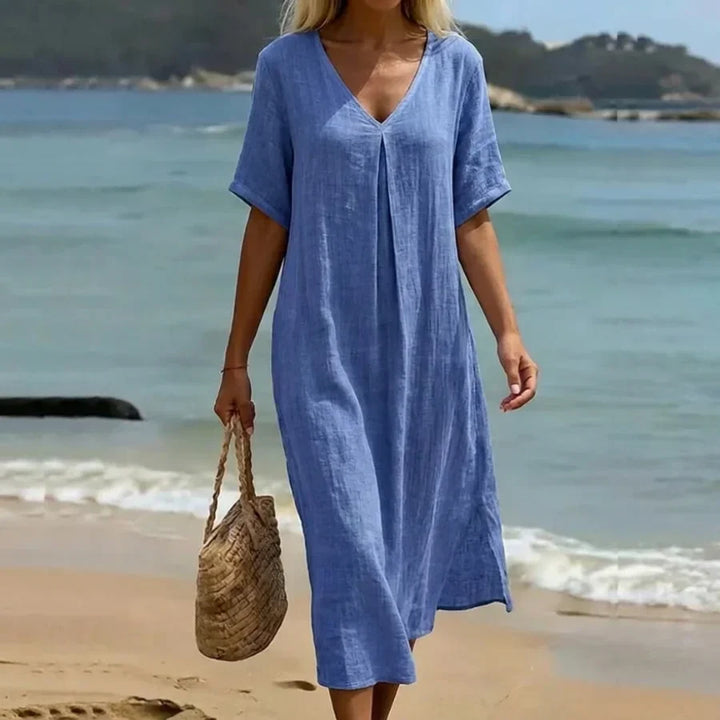 Women's relaxed fit V-neck midi dress with short sleeves for comfortable everyday wear.