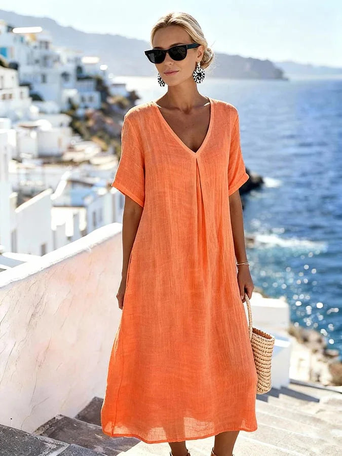 Ultra-comfortable women's V-neck midi dress, short sleeves, relaxed fit for all-day wear.