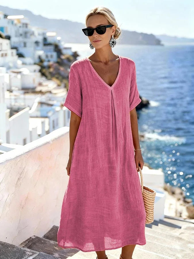 Simple women's V-neck midi dress, short sleeves, relaxed fit; versatile for any casual event.