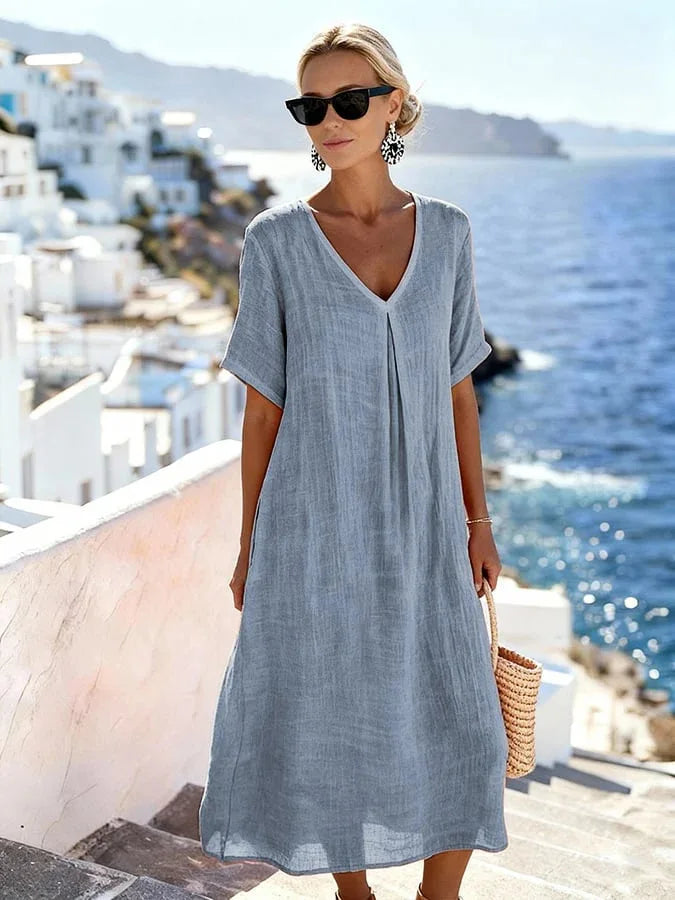 Effortless women's relaxed fit V-neck midi dress, short sleeves, essential for everyday summer style.